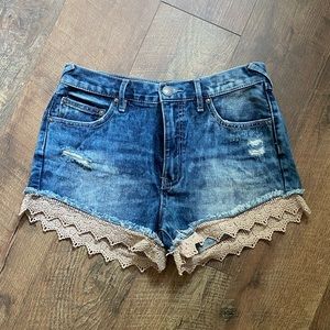 Free People lace-knit trim denim shorts